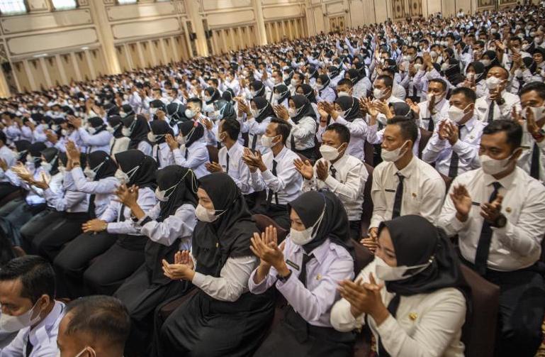 perbedaan asn dan pns